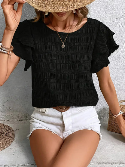 Charmaine | Blusa ligera y fresca con divertidos volantes